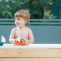 New Plan Toys Bateau pingouin