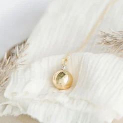 New Pleine Lune Bola de grossesse Origine Perle chaîne (or jaune 18 carats)