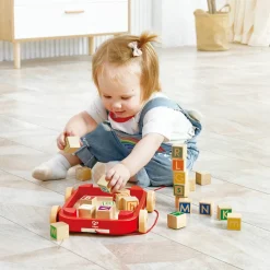 Chariot à roulettes avec blocs empilables|Hape Outlet